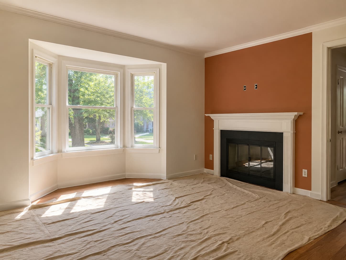 Living room with freshly painted terracotta accent wall
